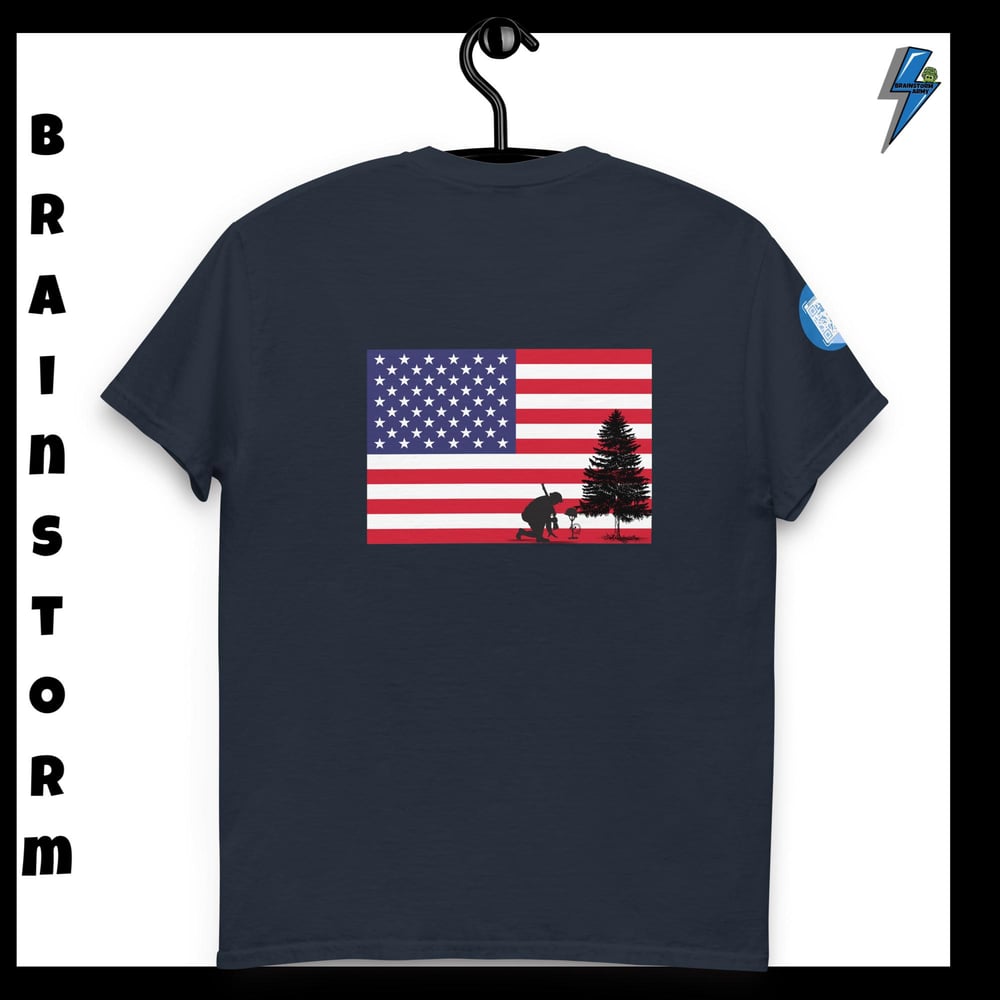 The American flag with a soldier kneeling classic tee