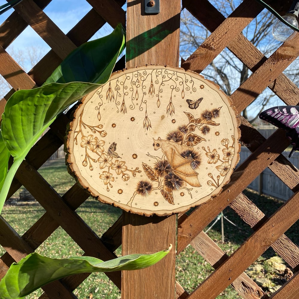 Image of life in the leaves wood art