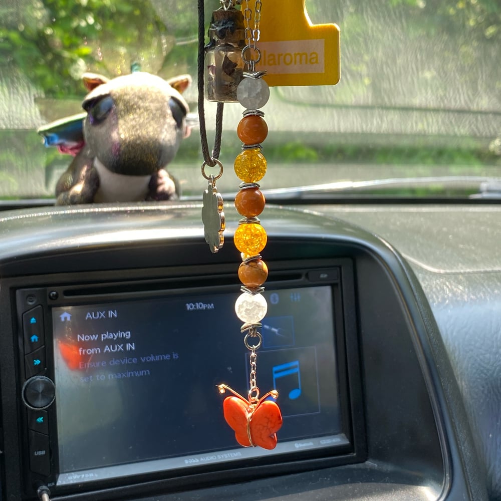 Image of orange butterfly car beads