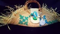 Image 1 of Raffia and leather purse with bamboo handles