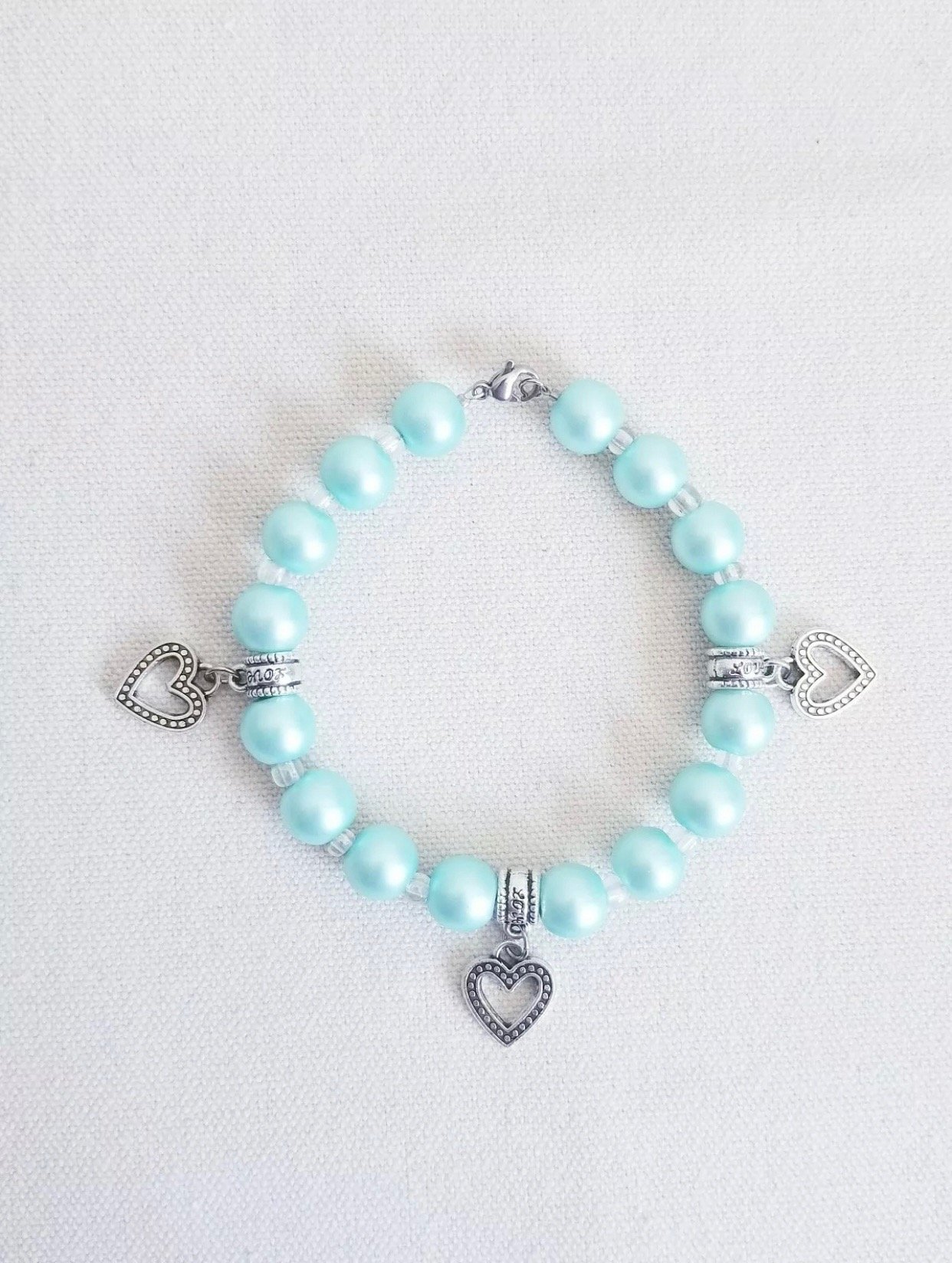 Image of Matte Aqua Glass Pearl Heart Charm Bracelet