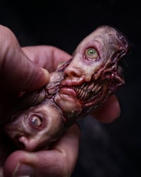 Image 17 of Face Off - collectible Clipper Lighter Sleeve