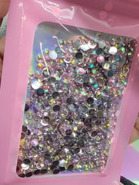 Image 1 of pink ab rimstone