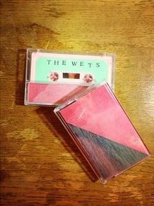 Image of The Wets / A Haircut - Split Cassette