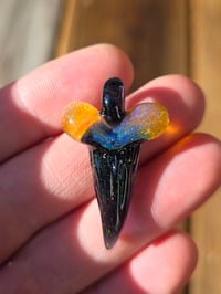 Image 1 of Fully opalized amber purple/ black glass shark tooth pendant 