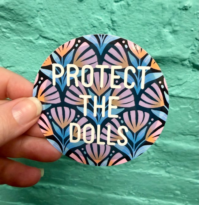 "protect the dolls” vinyl sticker