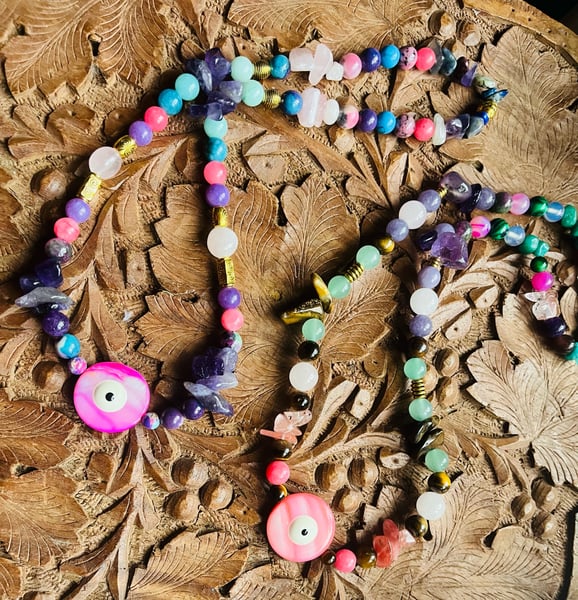 Image of Pink  agate evil eye protection prayer beads 