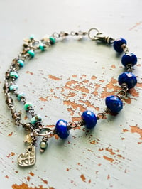 Image 2 of wire wrapped lapis lazuli and turquoise charm bracelet 