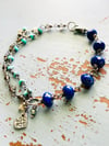 wire wrapped lapis lazuli and turquoise charm bracelet 