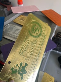 Image 2 of GOLD & GREEN FELIX CADILLAC ICONIC LICENSE PLATE 
