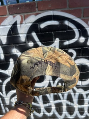 Image of Upset camo hat (black)