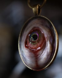 Image 4 of Color Shift Eye glow in the dark pendant OOAK