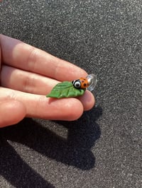 Image 4 of Small Green Leaf W/ Orange Bug Eyed Ladybug pendant 