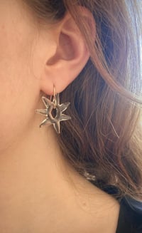 Image 1 of Étoiles de verre transparent/doré