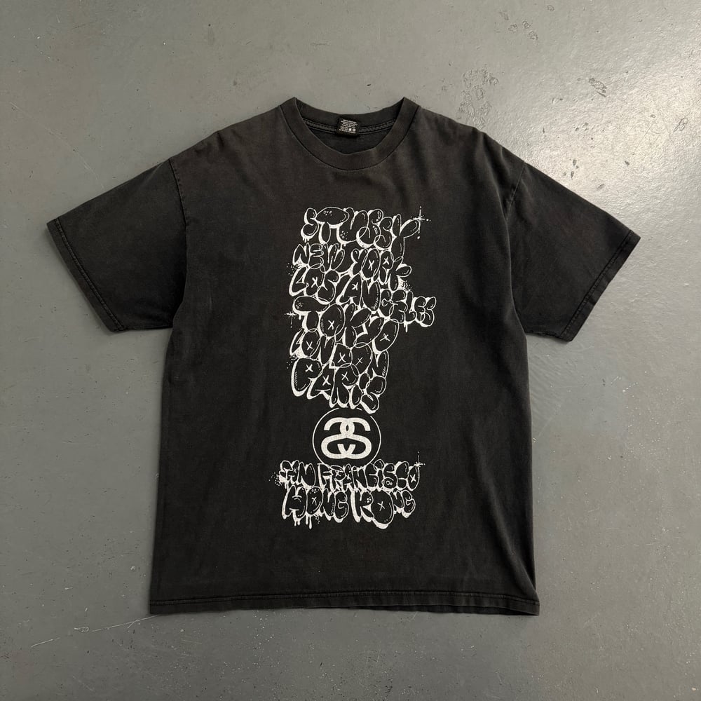 Image of Stussy x Kaws t-shirt, size Large