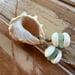 Image of Hawaiian Ivory Drupe Shell Necklace with Puka Shells, Teal Seaglass (22 inch)