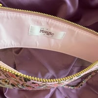 Image 2 of magical friends vinyl pouch