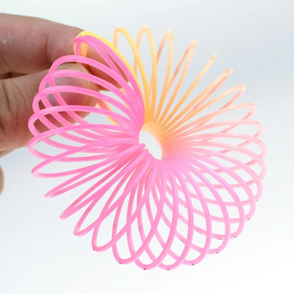 Image of 24PCS Rainbow Magic Springs Circle Toys Kids Birthday Party Favors Guests Giveaway Small Gifts Pinat