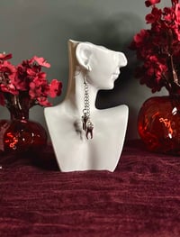 Image 1 of ‘Wisdom teeth trap’ earrings 