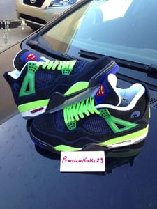 Image of Air Jordan Retro 4 "Doernbecher"
