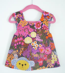 Image of Multi coloured flower pinafore
