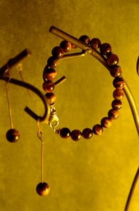 Image of Year of the Tiger Eye stones/sterling silver bracelet $40.00 Earrings $10.00 (sold separately)