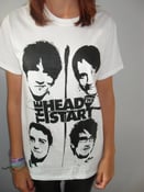 Image of 'Faces' Tee