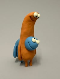 Image 2 of A blue thing peeking out of a brown thing 2