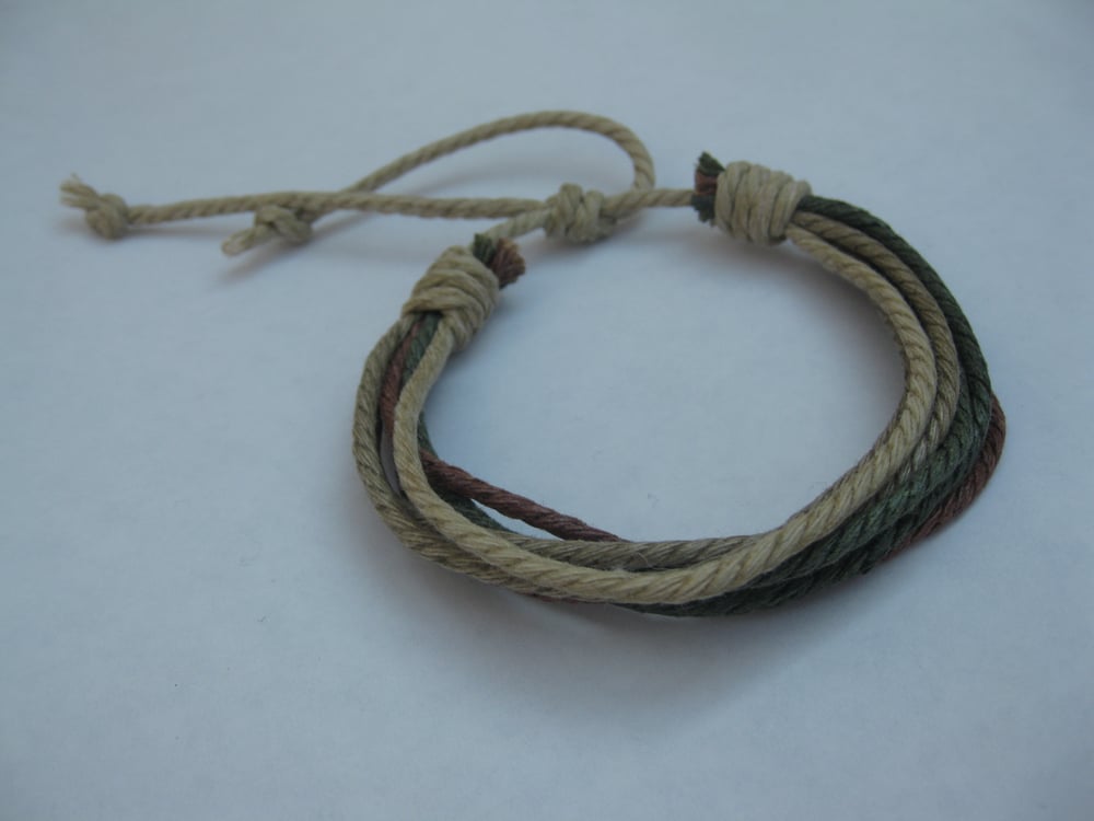 Image of Host. String Bracelet 