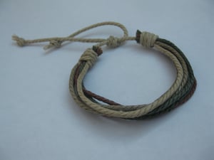 Image of Host. String Bracelet 
