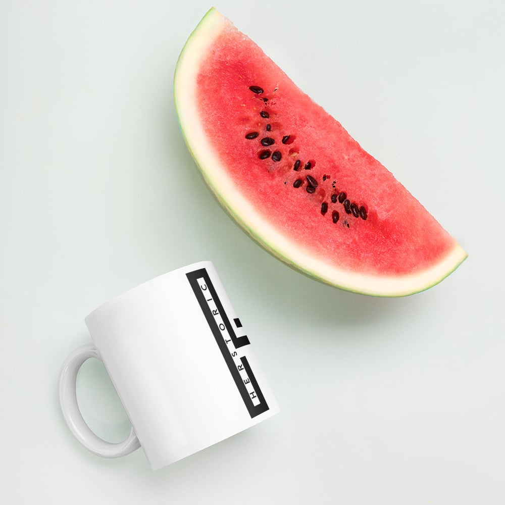 White glossy h mug