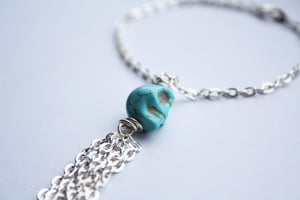 Image of Genuine turquoise skull tassel bracelet