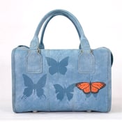 Image of Blue Carry-On with Insects