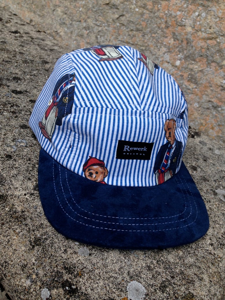 Image of 5 Panel cap with 'Ralph Bear' design and full suede peak