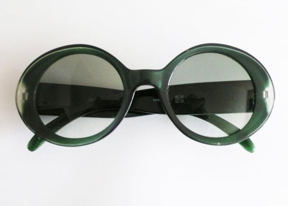 Image of Krew Denim Sunglasses Bottle Green Jim Grecco signature design.