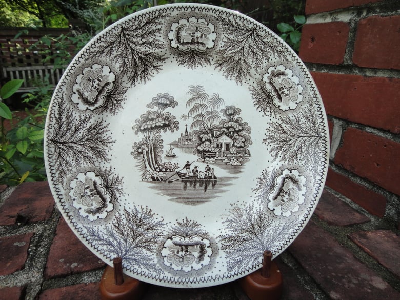 Image of A Charming Boat Rower's Brown and White Brown Transfer Plate.