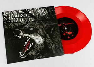 Image of 'The Dogs/The Swamp' Double A-side 7" single.