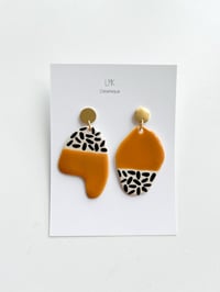 Paire de boucles d'oreilles céramique UPA miel