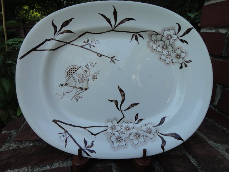 Image of A Delicate Yet Bold Aesthetic Small Brown and White Transfer Platter