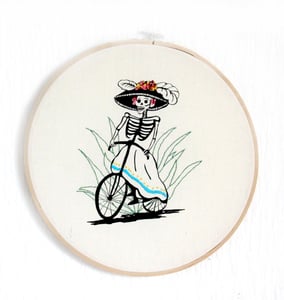 Image of Catrina en bicicleta