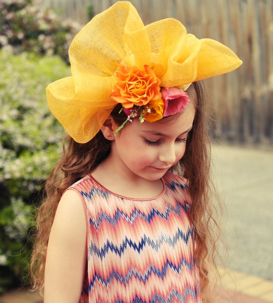 Image of Bright yellow wave fascinator