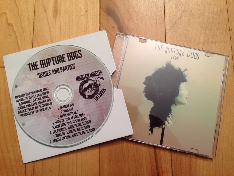 Image of The Rupture Dogs - 'feral' and 'dsides and parties'