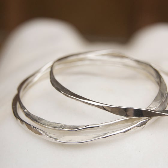 Image of Flowing hammered bangles