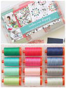 Image of large spool aurifil color me happy thread 