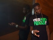 Image of "Yes I Am Famous" T-Shirt Black//Illuminious Green Logo//***X LARGE SOLD OUT ***