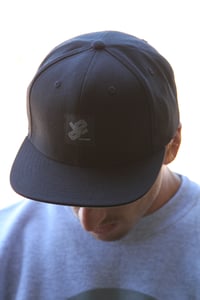 Image of Division East Interlocking Logo Patch Snap Back Hat