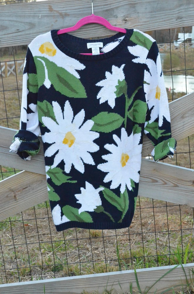 Image of Caught in a Daisy Sweater