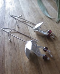 Image 4 of Forged sterling silver bell flower hooks with garnets