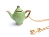 green and gold teapot necklace