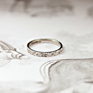 Image of Platinum 2mm flat court floral engraved ring